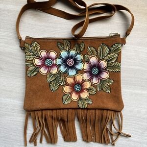 Handmade suede leather crossbody floral tan fringe bag.